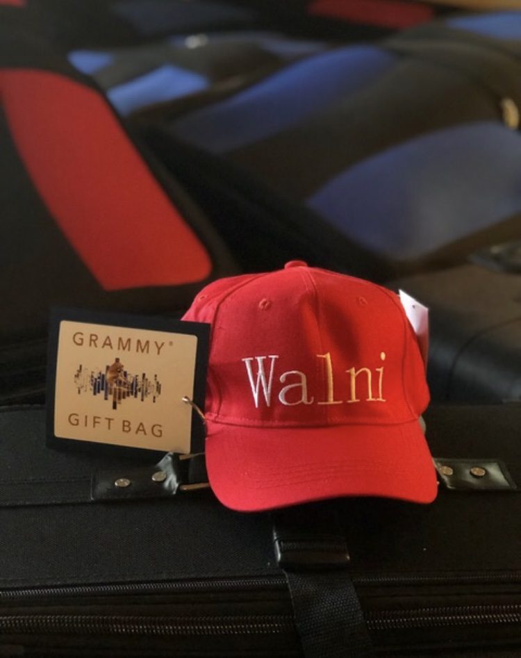 A red Walni World in a Grammy Gift Bag
